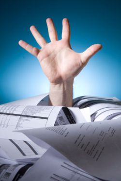 drowning in paperwork